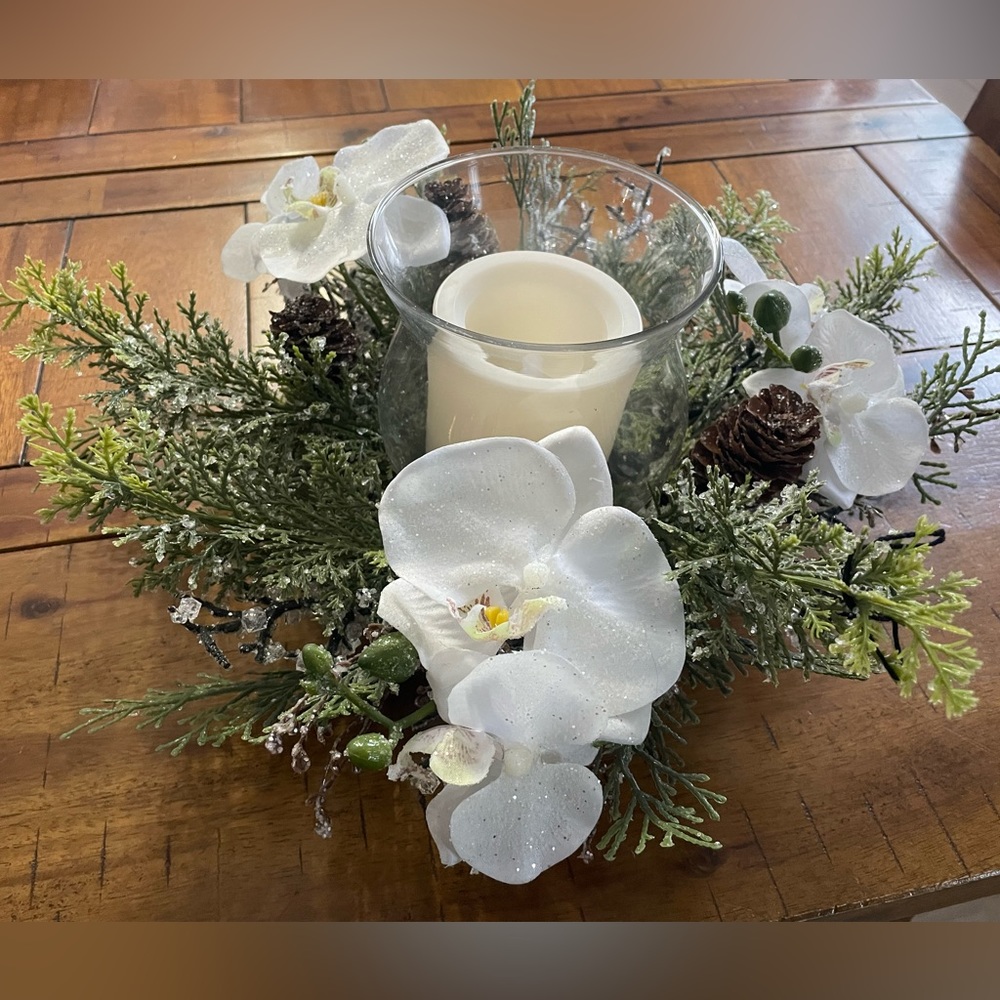 Beautiful white winter centerpiece with flameless candle